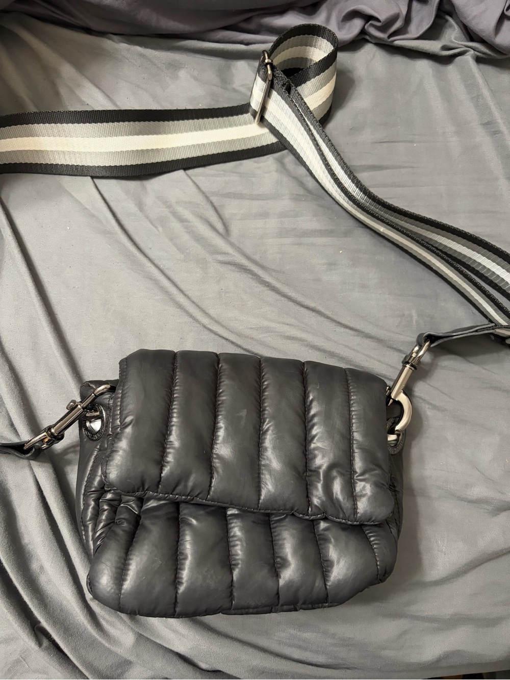 THINK ROYLN Black Quilted Puffer Crossbody with Striped Strap